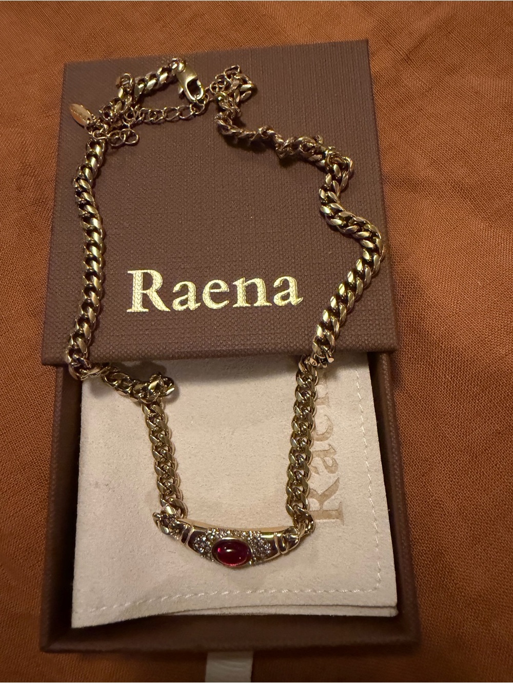 RAENA Gold Chain Necklace with Red Gemstone Accent